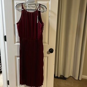 NWT Francesca’s red pleated dress. Make an offer!